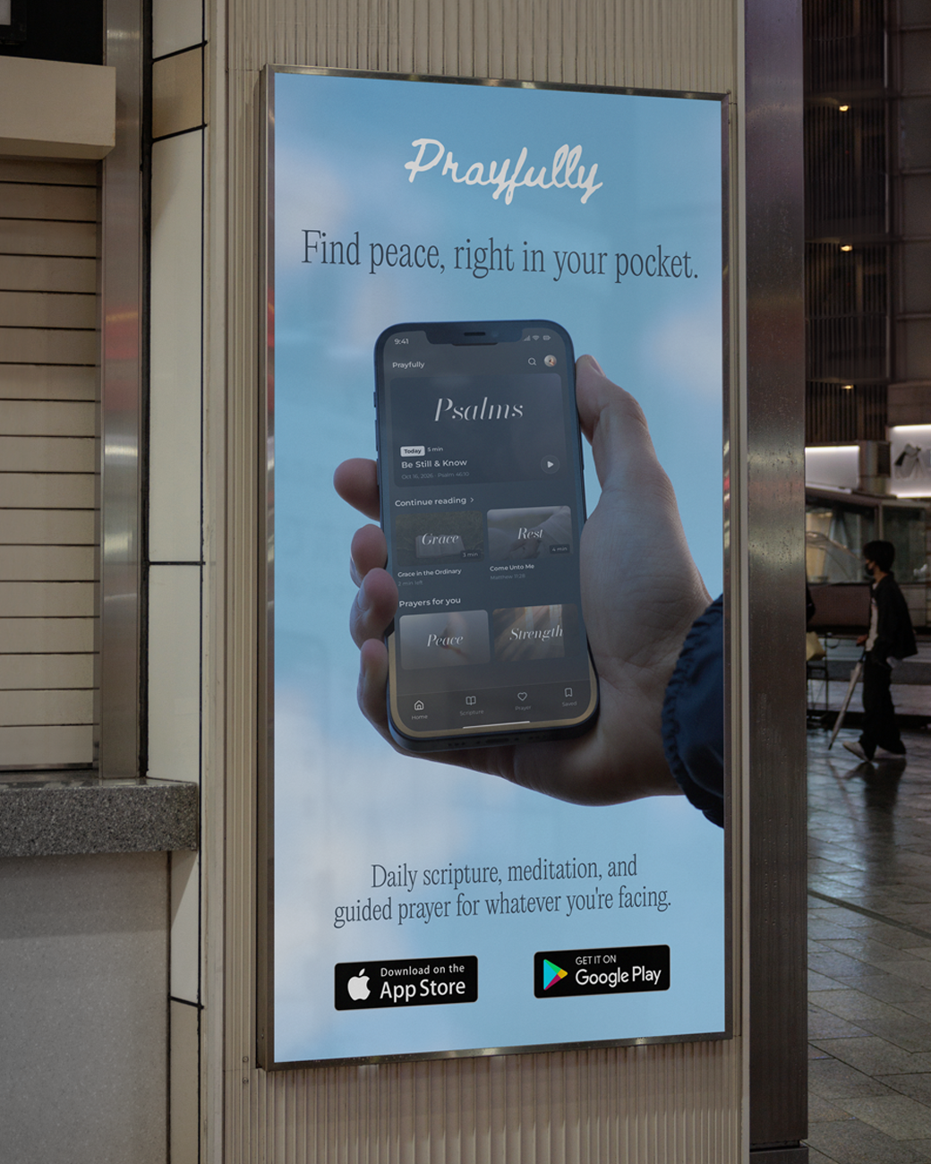 Prayfully app poster on a street pillar